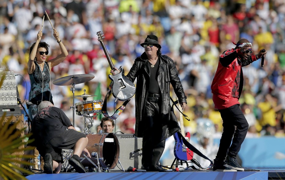 O guitarrista mexicano Carlos Santana e o rapper haitiano Wyclef Jean