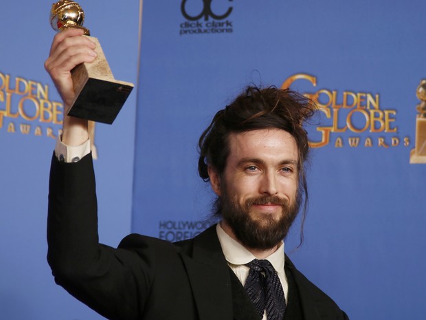 Alex Ebert vence o prêmio de melhor trilha original por 'All is lost' no 71º Globo de Ouro, que acontece neste domingo (12), em Los Angeles. (Foto: REUTERS/Lucy Nicholson)