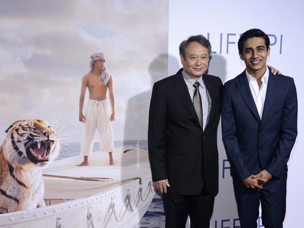 Cineasta Ang Lee e ator Suraj Sharma em estreia de 'As aventuras de Pi' em 16 de novembro na cidade de Los Angeles (Foto: Phil McCarten/Reuters)