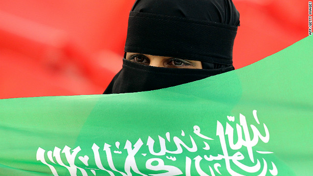 A aplausos de fãs de futebol da Arábia Saudita para sua equipe antes do início do Grupo B Copa da Ásia jogo contra a Jordânia, em janeiro de 2011. 